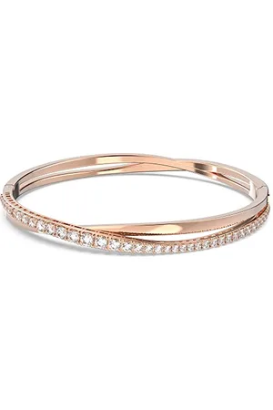 Swarovski Bracelet-jonc Twist femme, métal poli, pierres blanches éclatantes et placage de ton or rosé