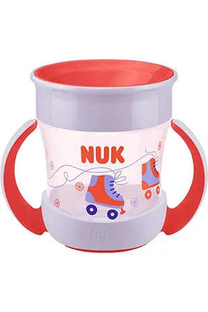 NUK Mini gobelet Magic Cup - Bord anti-déversement à 360° - 6 mois et plus - Poignées faciles à prendre en main - Sans BPA - 160 ml - Patins à roulettes rouges 10255606