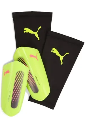 PUMA ULTRA Light Sleeve, Protège-tibias Unisexe, White-Glowing Red, XS - 030989