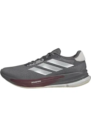 adidas Homme Supernova Ease M Chaussures de Course, Grey Four/Silver met./Shadow Red, 44 EU