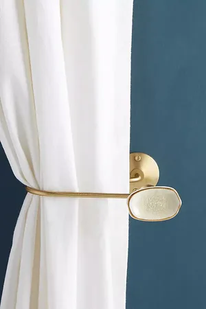 Anthropologie Attache arrière mouchetée en White chez