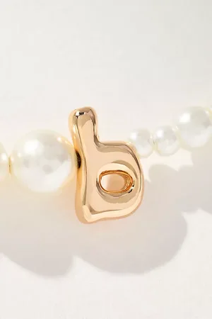Anthropologie Collier avec monogramme en perle par