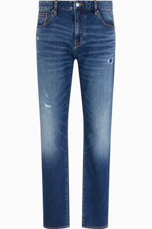 Armani Exchange Jean slim J13 en denim de coton délavé avec déchirures