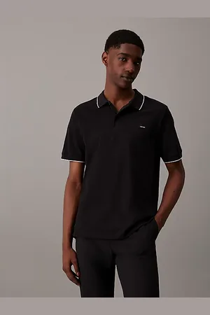 Calvin Klein Polo slim en piqué avec passepoil