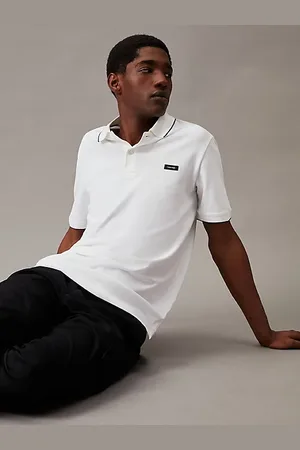 Calvin Klein Polo slim en piqué avec passepoil