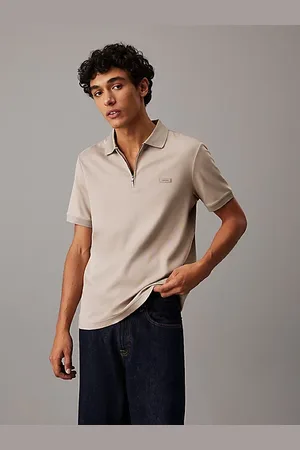 Calvin Klein Polo à fermeture zippée passepoilée