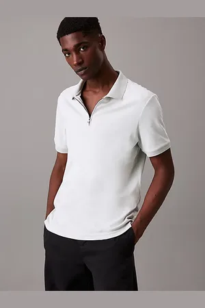 Calvin Klein Polo à fermeture zippée passepoilée