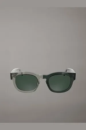 Calvin Klein Lunettes de soleil rondes CKJ25601S