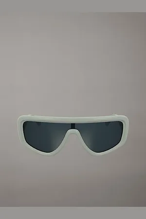 Calvin Klein Lunettes de soleil enveloppantes CKJ25605S