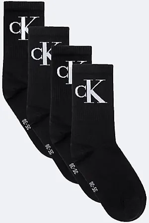 Calvin Klein Lot de 4 paires de chaussettes courtes avec logo en coton peigné doux