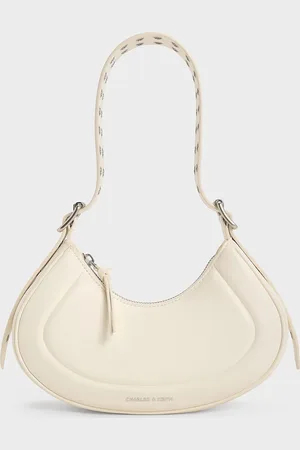 CHARLES & KEITH Sac porté épaule incurvé à lanière à œillets Petra