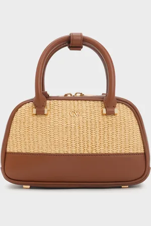 CHARLES & KEITH Sac bowling en cuir et en raphia