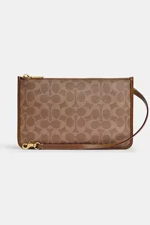Coach Pochette zippée en toile exclusive
