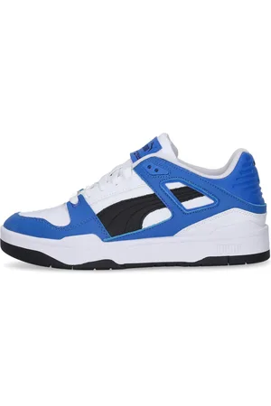 PUMA Chaussure basse Slipstream Lth pour hommes blanc/noir/equipe Royal