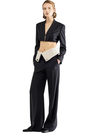 ERIKA CAVALLINI Pantalons pour femmes avec bâton tordu