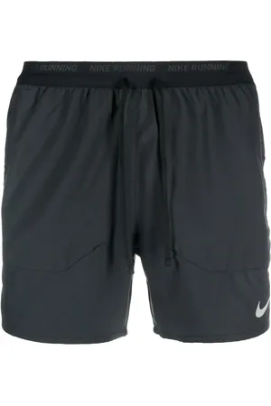 Nike Short de sport à imprimé Swoosh