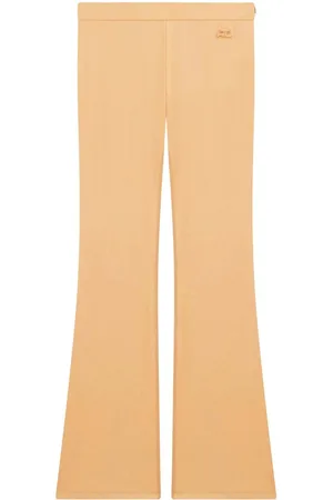Courrèges Pantalon évasé à logo brodé