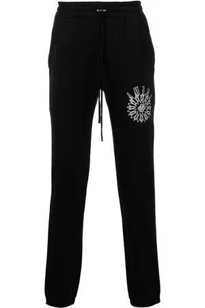 AMIRI Pantalon de jogging slim à logo imprimé