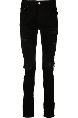 AMIRI Jean MX1 skinny à effet usé