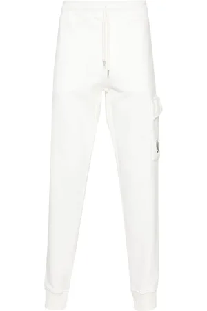 C.P. Company Pantalon de jogging à détail de lentille signature