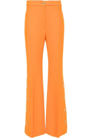Patou Pantalon évasé en laine à ourlet boutonné