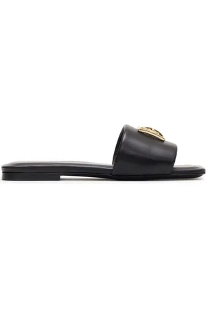 ANINE BING Claquettes Ria en cuir monogrammé