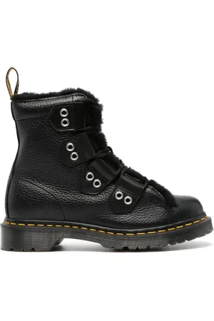 Dr. Martens Bottes à bordure en fourrure artificielle