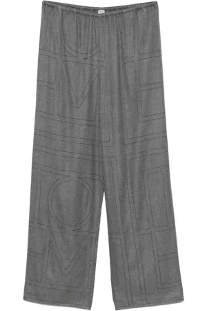 Totême Pantalon en flanelle à motif monogrammé