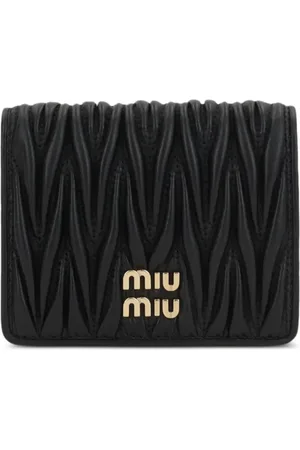Miu Miu Portefeuille matelassé à logo