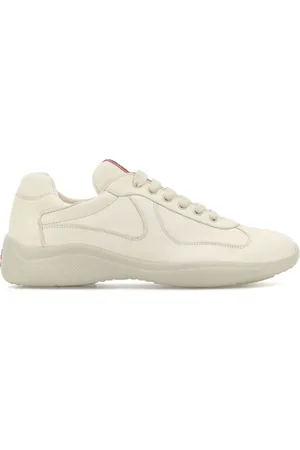 Prada Baskets en cuir à logo embossé