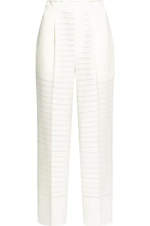 Issey Miyake Pantalon évasé à taille haute
