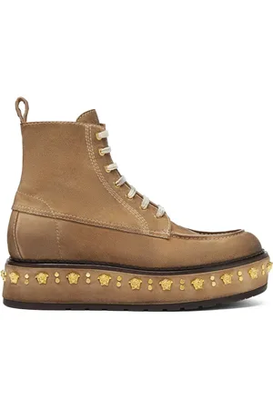 VERSACE Bottines à détails de clous sur la semelle