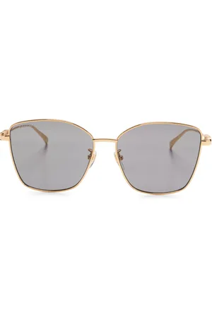 Gucci Lunettes de soleil à monture papillon