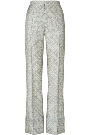 Tory Burch Pantalon en soie à imprimé monogramme T