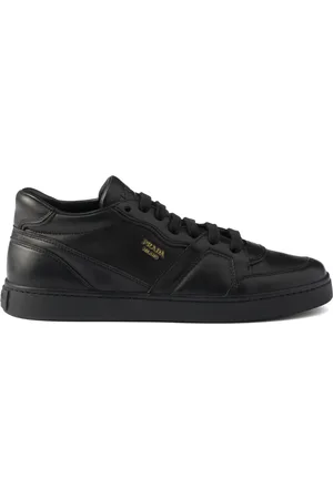 Prada Baskets en cuir à logo embossé