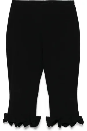 ROTATE Pantalon Capris à ourlet volanté