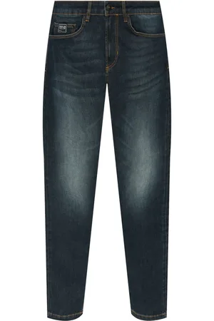 VERSACE Jean à patch logo