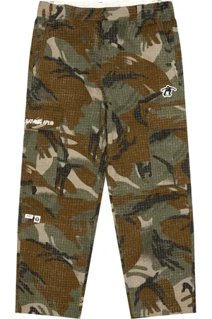 A Bathing Ape Pantalon à imprimé camouflage