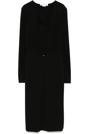 GENNY Robe courte à col v