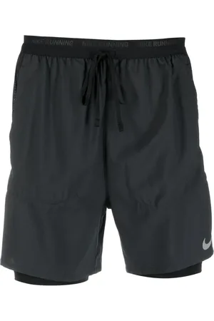 Nike Short de sport à logo imprimé