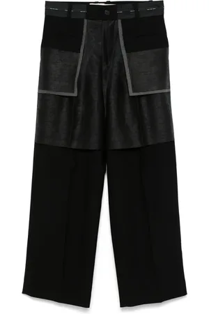 Feng Chen Wang Pantalon imprimé à design patchwork