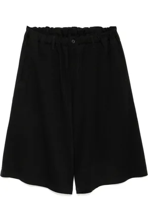 YOHJI YAMAMOTO Bermuda à coupe sarouel