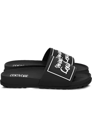 VERSACE Claquettes à logo strassé