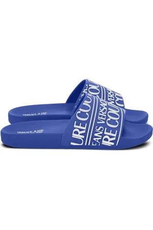 VERSACE Claquettes à logo embossé