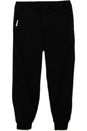 A Bathing Ape Pantalon fuselé à patch logo