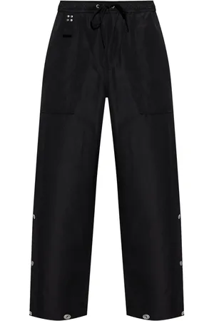 Comme des Garçons Pantalon à boutons décoratifs
