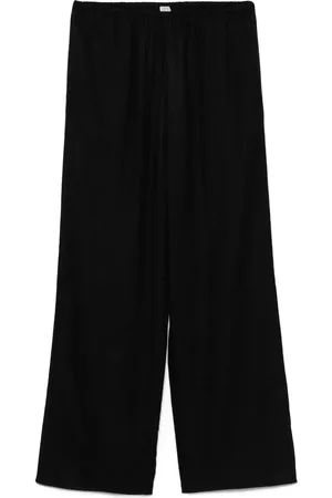 Totême Pantalon en flanelle à motif monogrammé