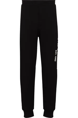 Alexander McQueen Pantalon de jogging à imprimé graffiti