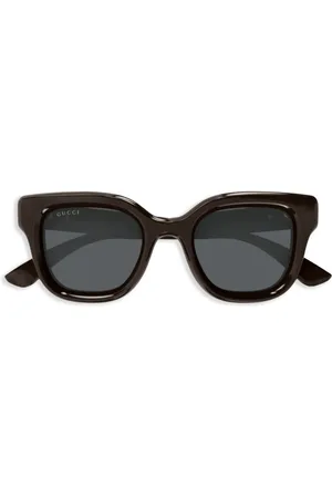 Gucci Lunettes de soleil à plaque logo