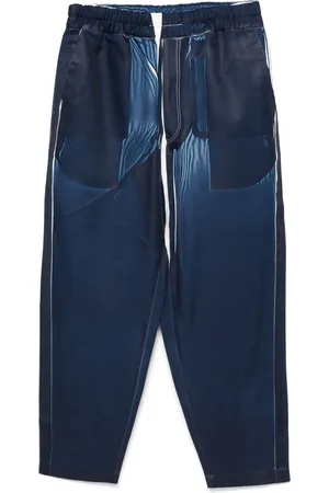 Comme des Garçons Pantalon à imprimé jean
